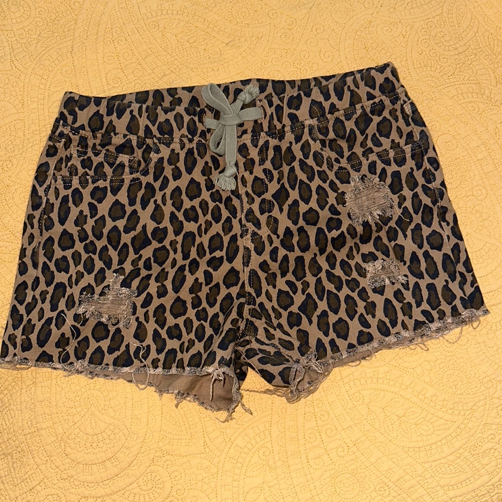 Animal print shorts with elastic, drawstring waist.